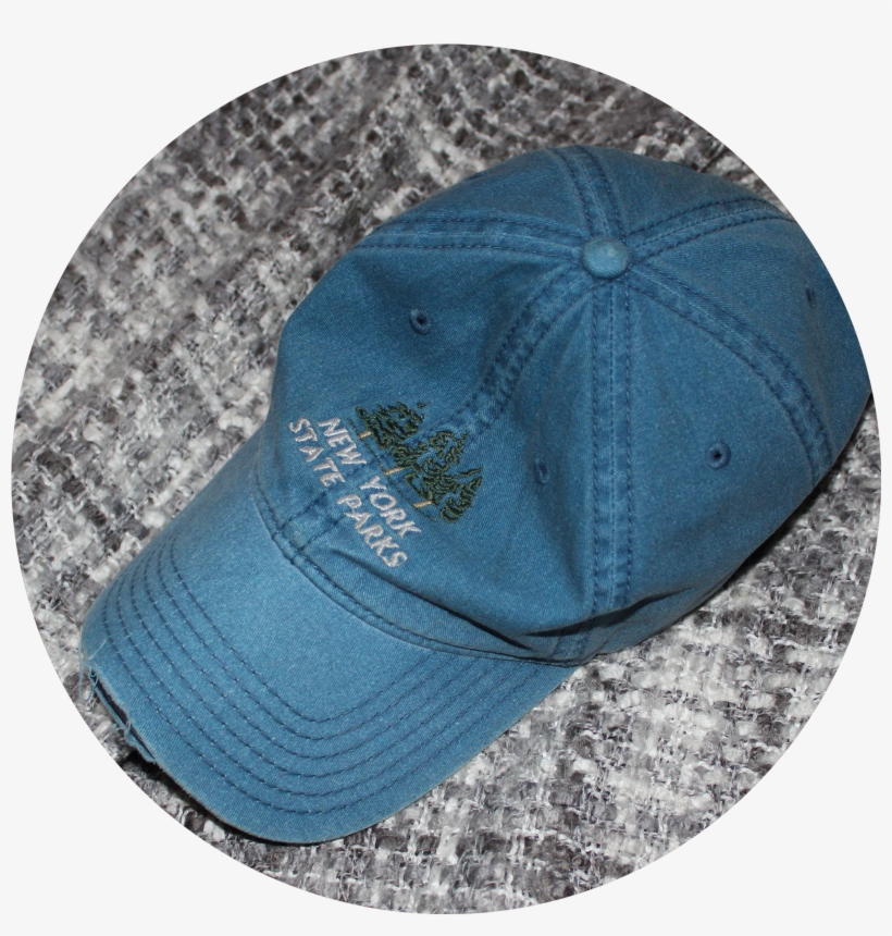 A Faded Dark Blue Jean Baseball Cap Sits On A Grey - Baseball Cap, transparent png #2935318