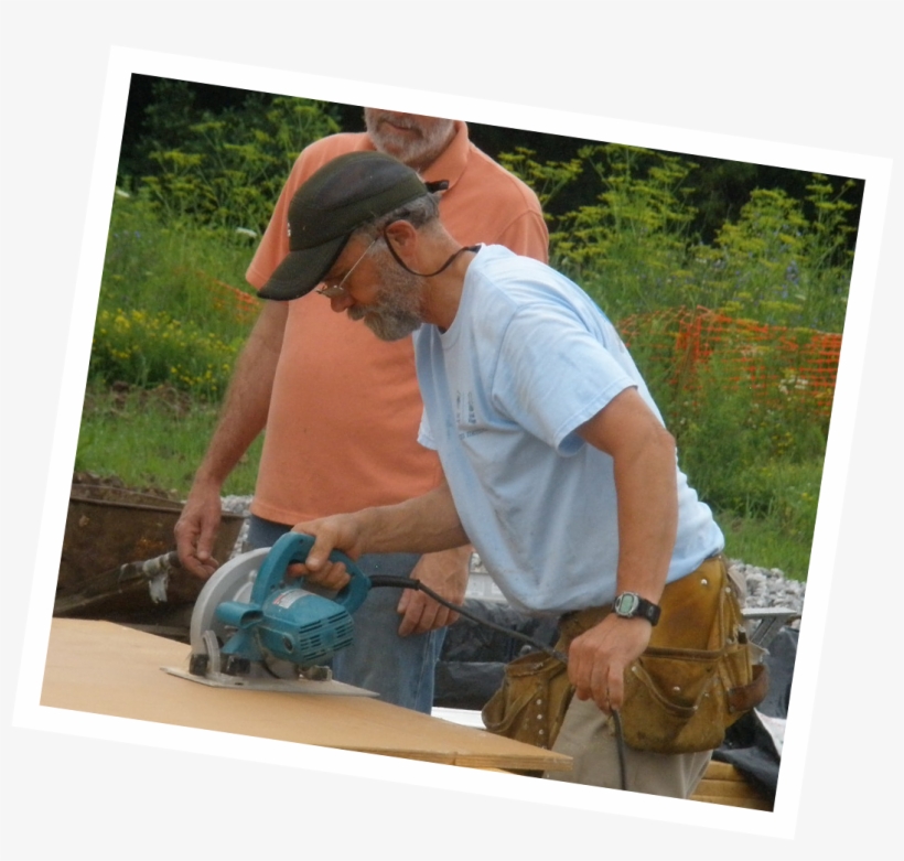 A Volunteer Uses A Circular Saw To Cut A Board On A - Backpack, transparent png #8305772