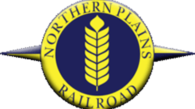 Christmas Caboose Nearly Overflows With Donated Toys - Emblem (620x349), Png Download