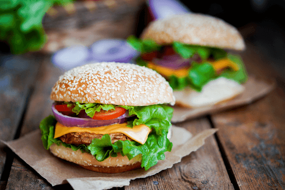 Classic Beef Burgers - Lettuce On A Burger (582x388), Png Download