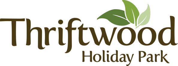 Thriftwood Holiday Park (594x222), Png Download