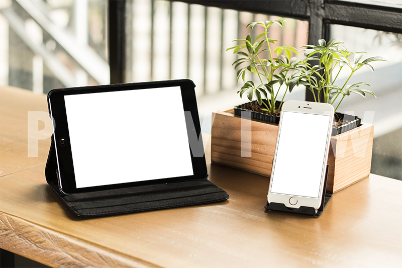 Iphone And Ipad On Top Of Bench With Plants On The - Table (800x533), Png Download