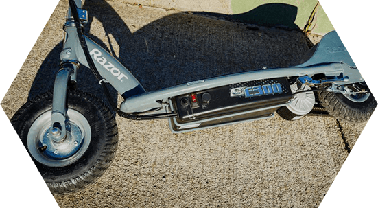 Razor E300 Electric Scooter Review - Razor E300 (551x303), Png Download