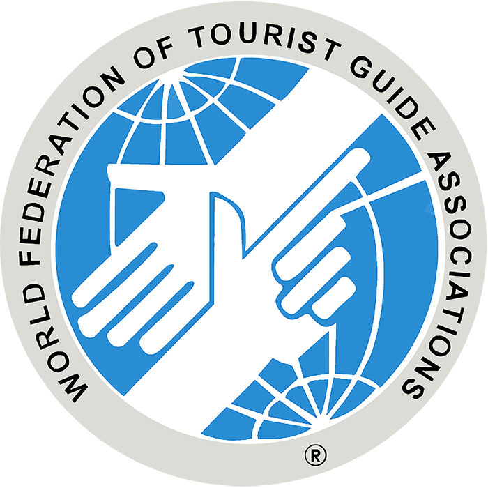 Wftga Logo - Luxuria Tours - Logo World Federation Of Tourist Guide (700x700), Png Download