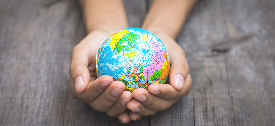 Our Mission - Person Holding Globe (1078x495), Png Download