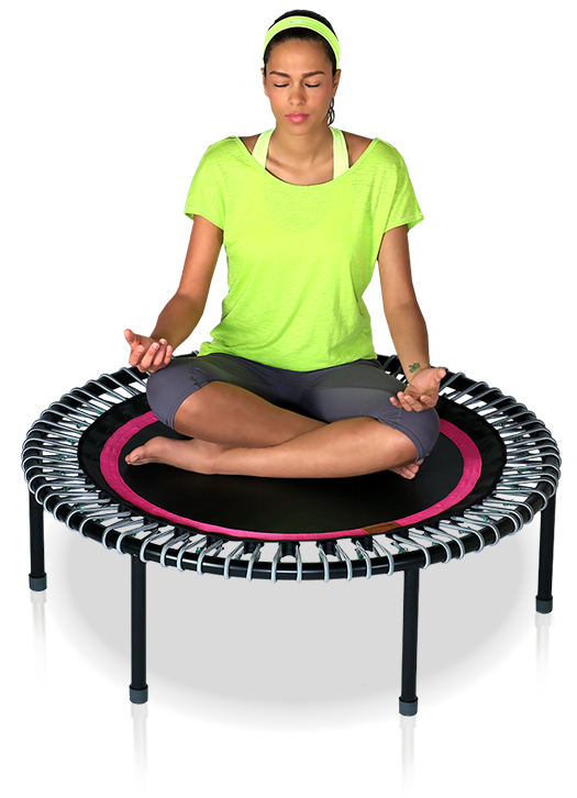 A Woman Sits Meditating Cross Legged On A Bellicon® - Trampolin Bellicon (526x848), Png Download